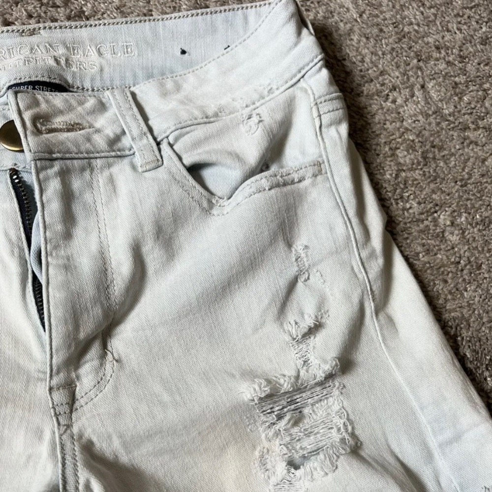 American Eagle Hi-rise Super Stretch Sky Distressed Light Jean Shorts - Size 4.